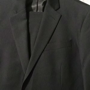 Kenneth Cole suit.